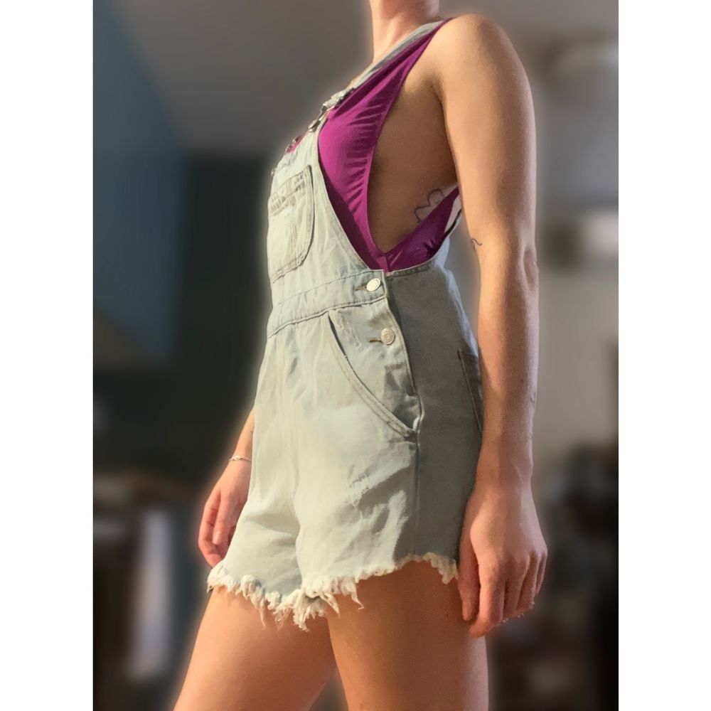 Denim cut off overalls